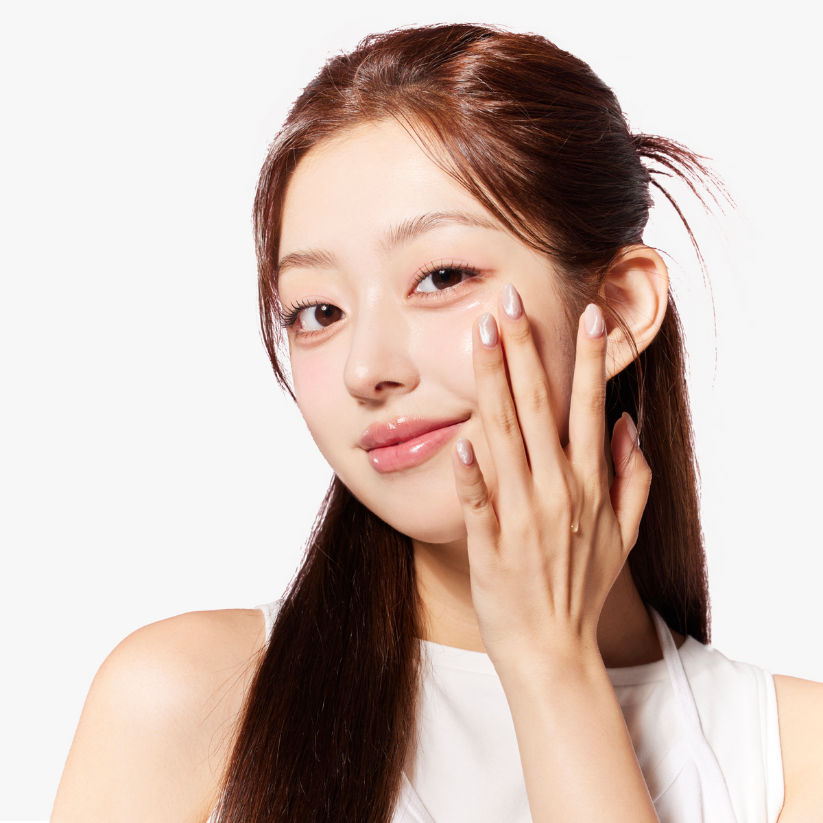 Model with luminous, dewy complexion gently touching her cheek, showing hydrated skin after applying COSRX The 6 Peptide Skin Booster Serum; first-step K-beauty peptide serum clinically tested to enhance glow, firmness, and smoothness for slow-aging skincare routines.