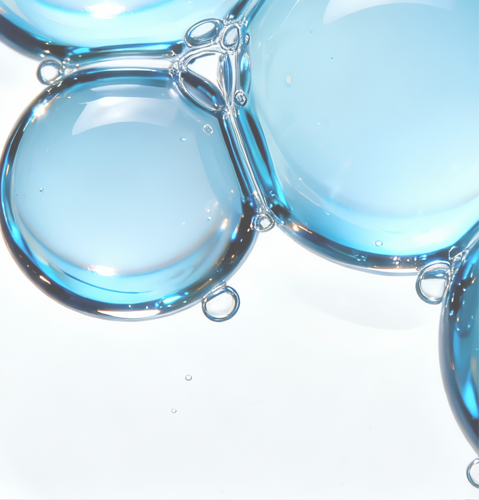 Close-up of hydrating blue liquid bubbles representing five types of ceramides, NP, NS, AP, AS, and EOP, used in COSRX formulas to reinforce the skin barrier and seal in deep hydration for dry and sensitive skin.