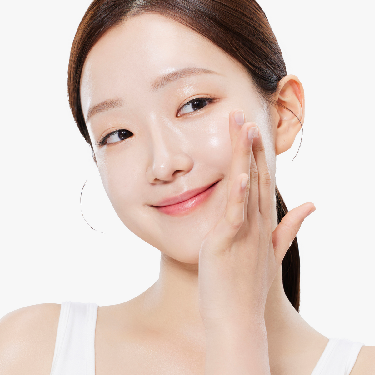 Model smiling while applying COSRX The Niacinamide 15 Serum onto skin; demonstrates non-sticky, quick-absorbing texture that layers well under moisturizer or sunscreen, suitable for daily acne care and barrier repair routines.